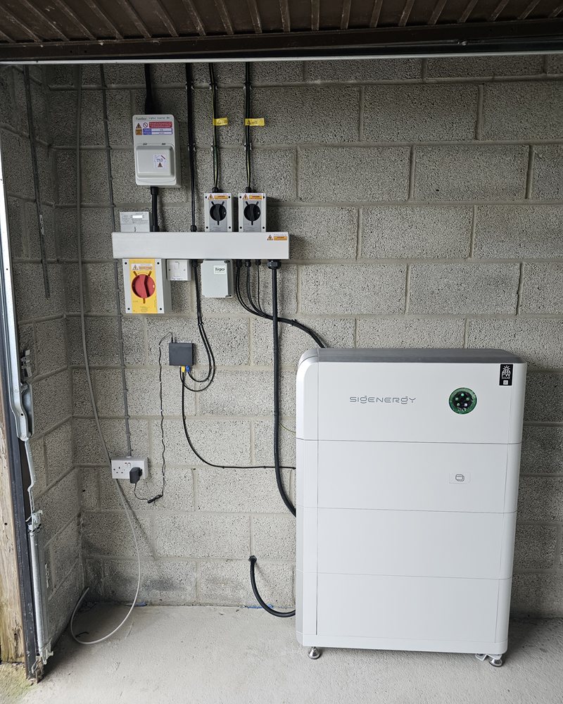 SigenStor battery installed alongside a DC EV charger