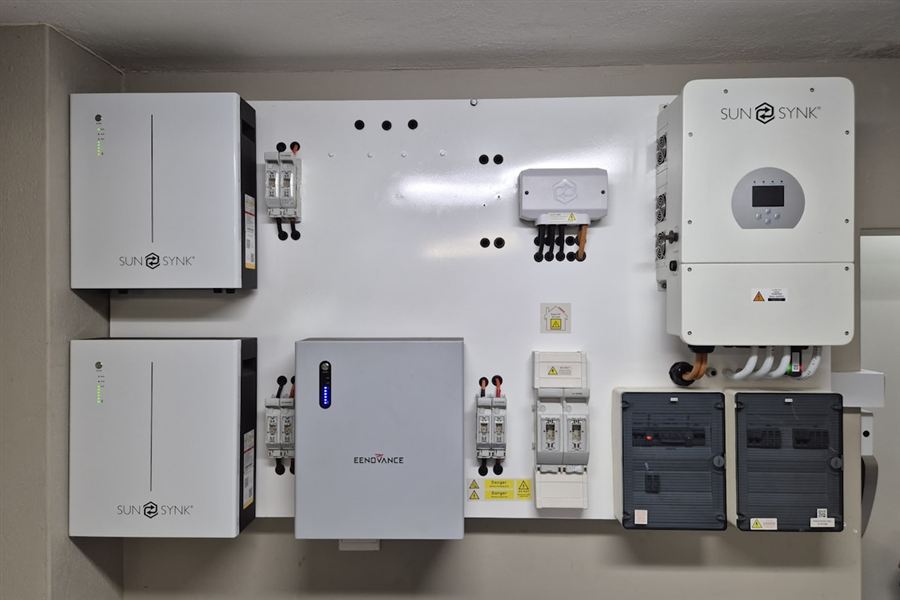 Home battery storage unit installed on a wall